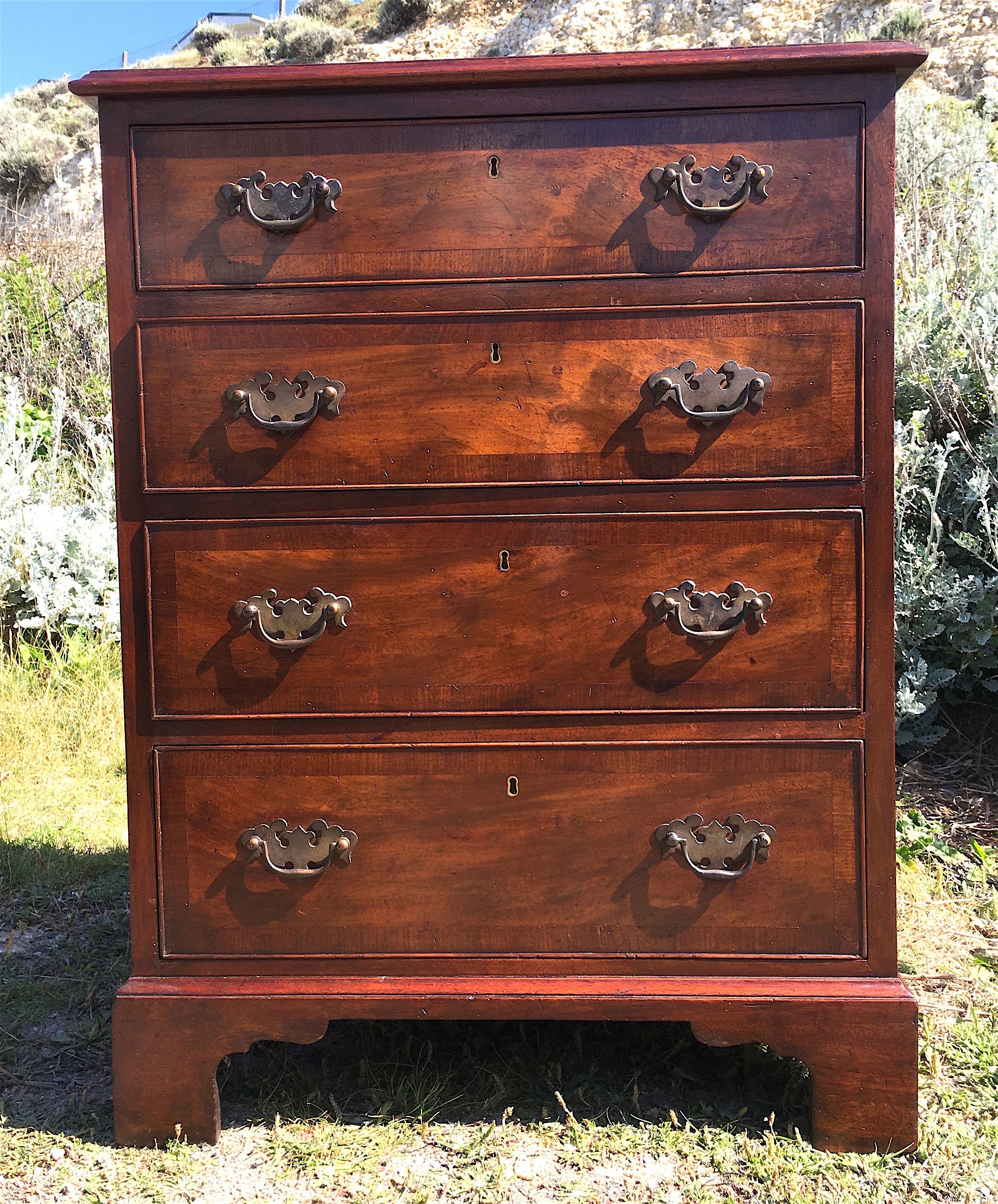 A small George III style mahogany chest, width 60cm, depth 46cm, height 78cm